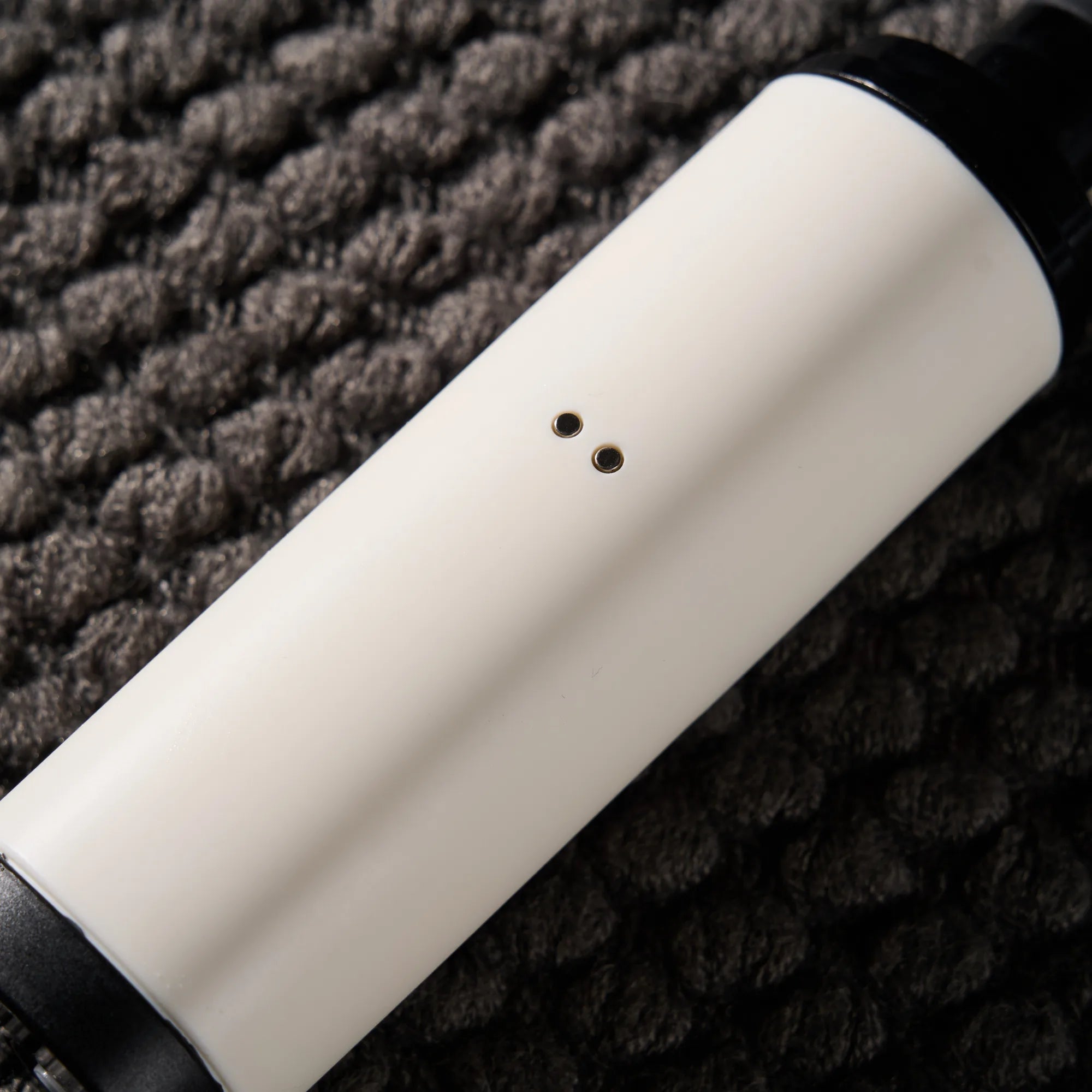 Image of Magnetic charging interface detail of automatic silicone doll cleaning system motor unit