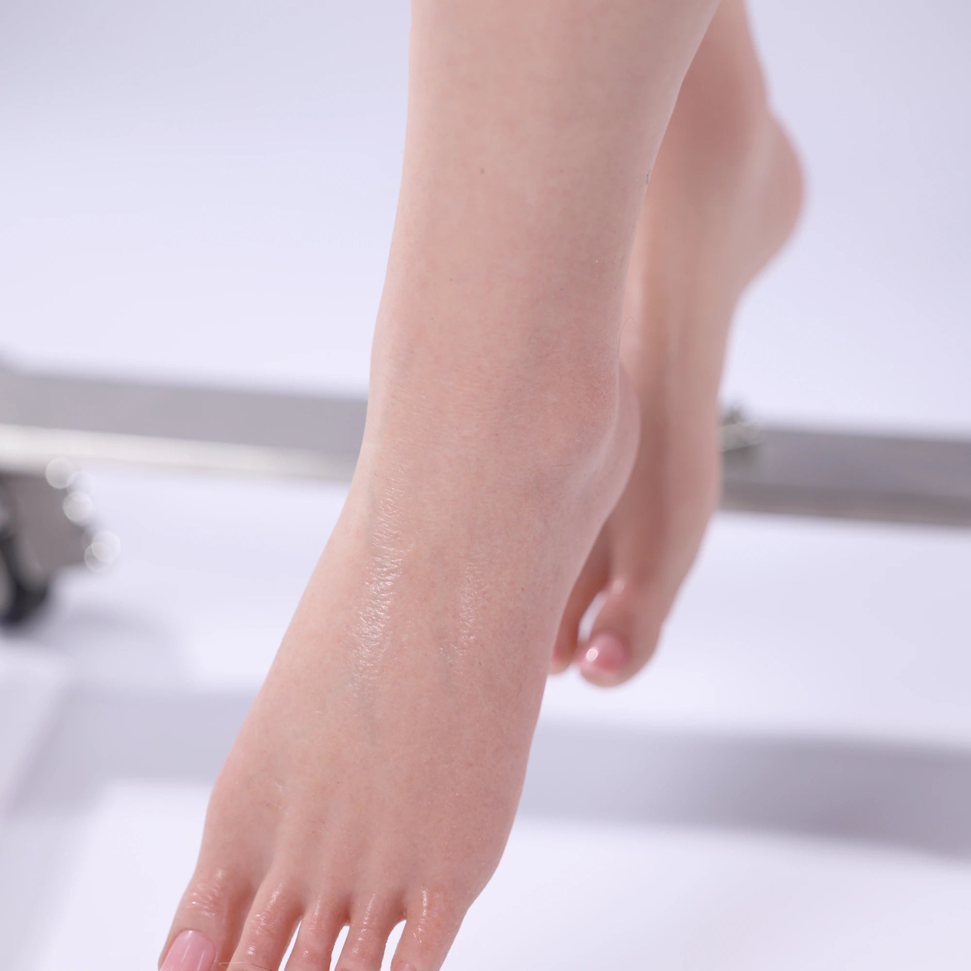 Image of bbw sex doll Lana close up of foot showing realistic veins and detailed silicone texture