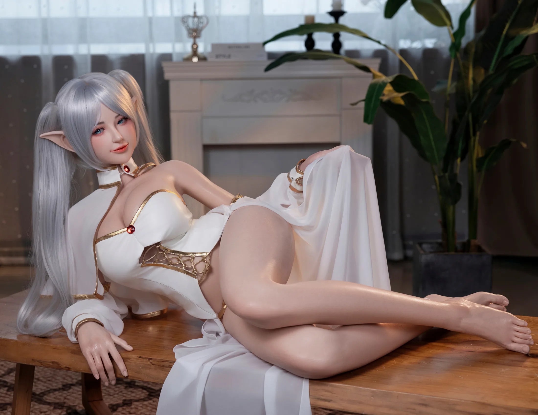 Image of Elven reclining in white-and-gold cosplay with her complete silver-haired elf styling visible