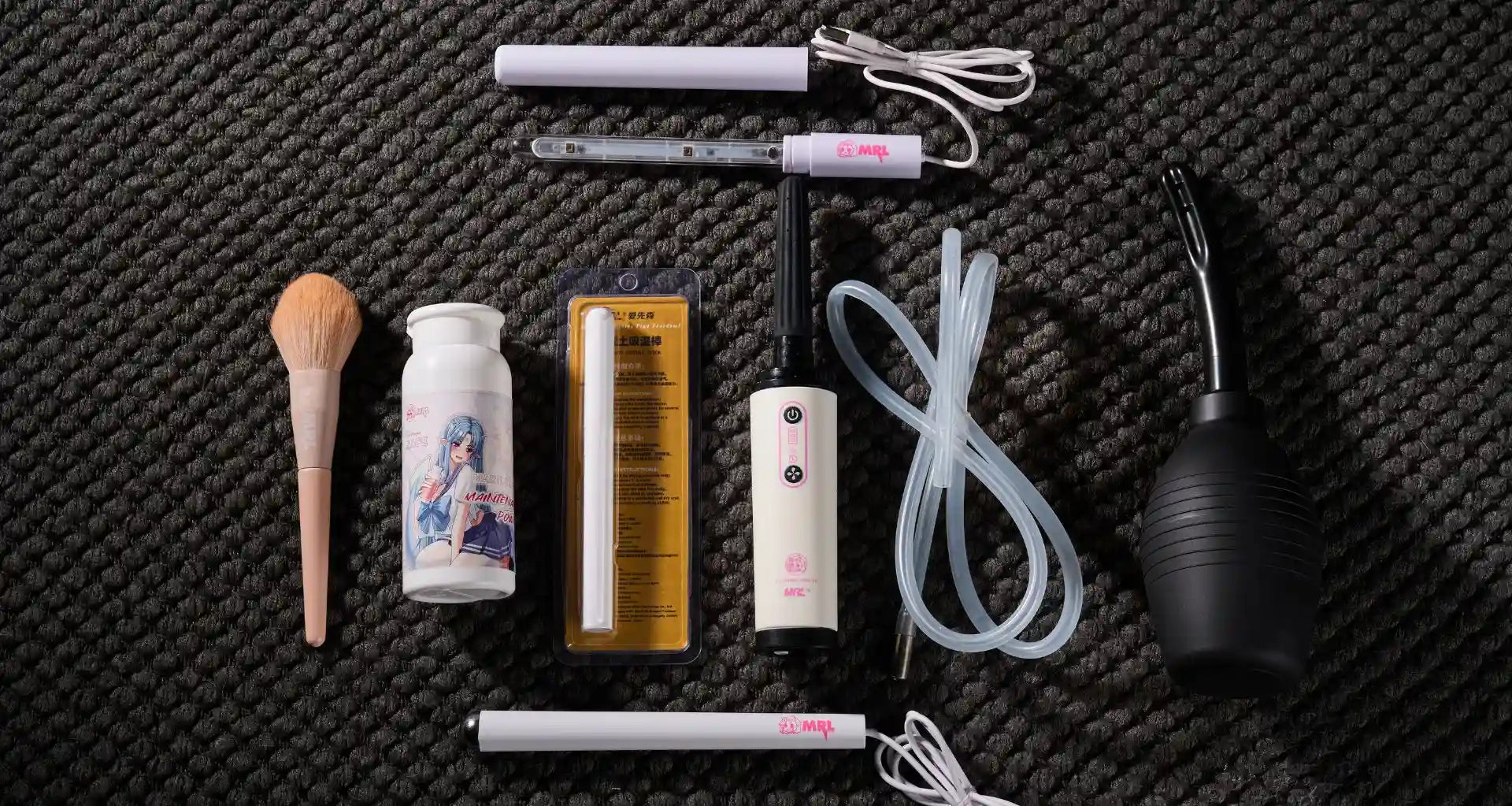 Complete MRLDOLL silicone doll cleaning and maintenance kit including drying rod, automatic cleaner, manual cleaner, heating rod, UV sterilization rod, protective powder, and brush