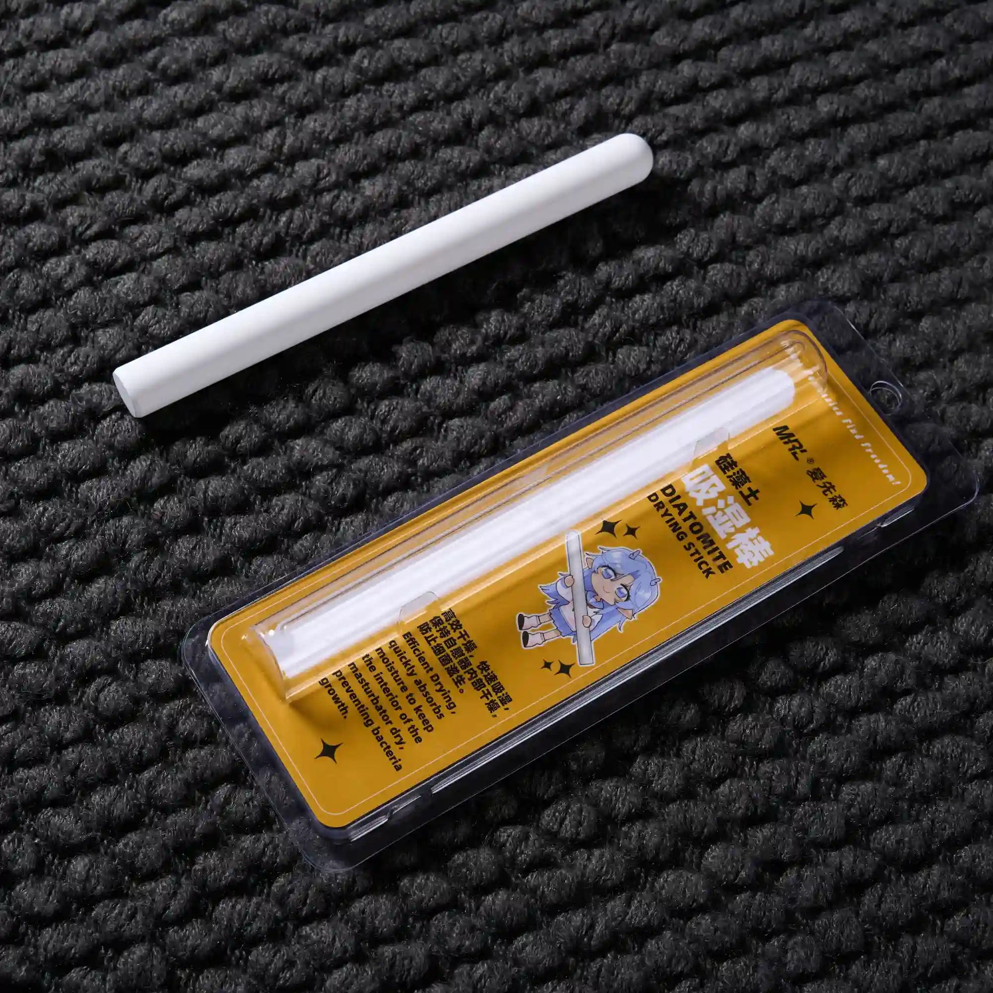 Image of Flat lay of MRLDOLL silicone doll dehumidifying rod displayed with original packaging box for moisture control and maintenance
