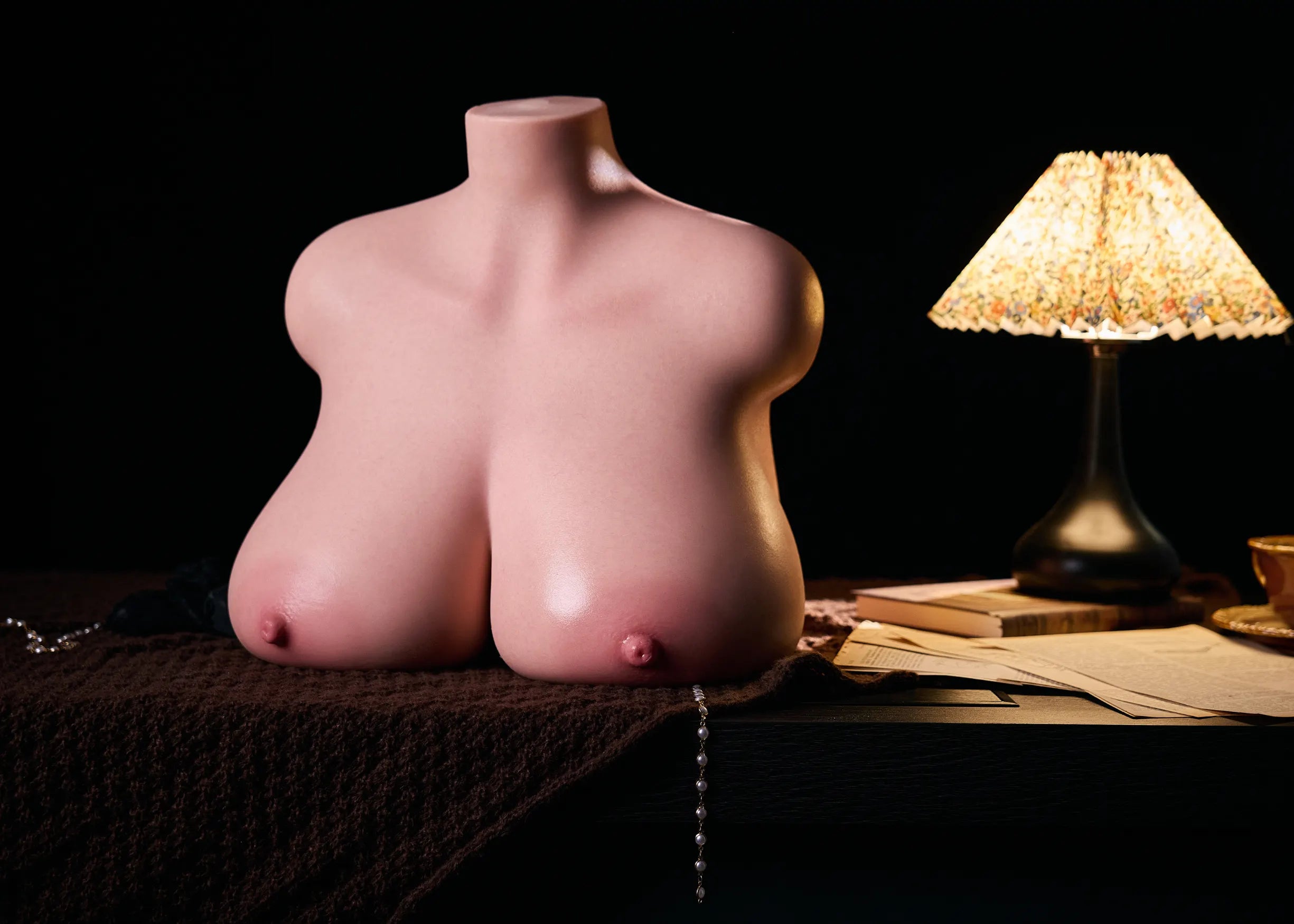 Image of MRLDOLL Tess torso placed on a desk, front view showcasing the product and creating a calm, luxurious atmosphere
